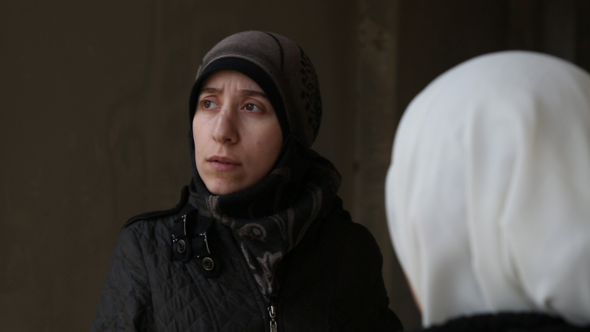 Still from the film the Cave showing two women