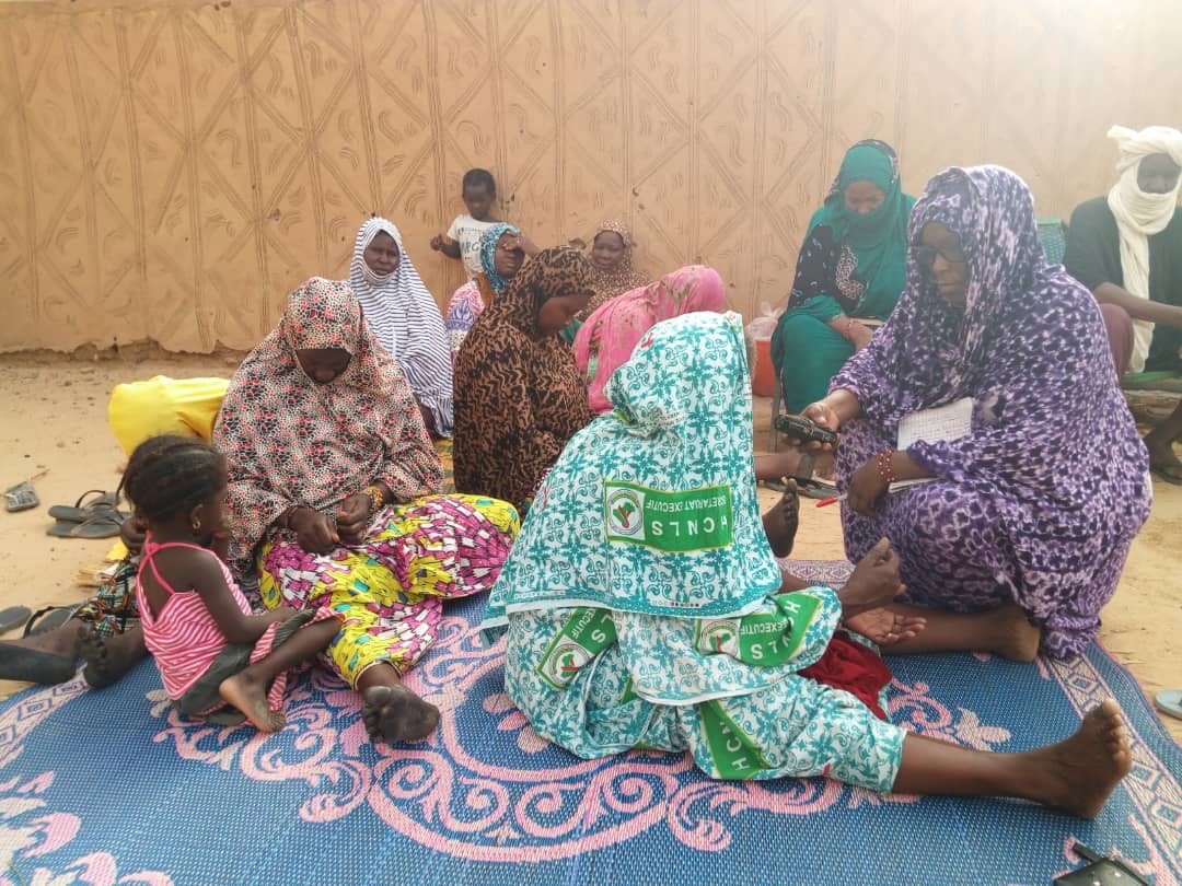 Women participate in a women's listening club in Mali.