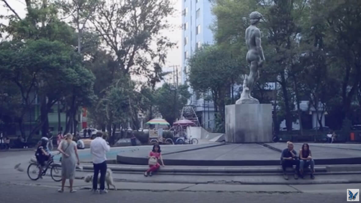Video still of a woman journalist from Mexico sitting in a park. From the Open Democracy article Rights Defenders at Risk in Mexico